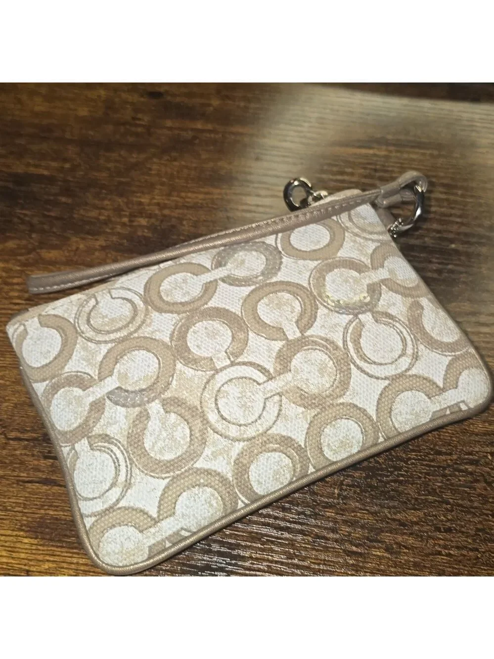 Coach shimmer bronze wristlet bag